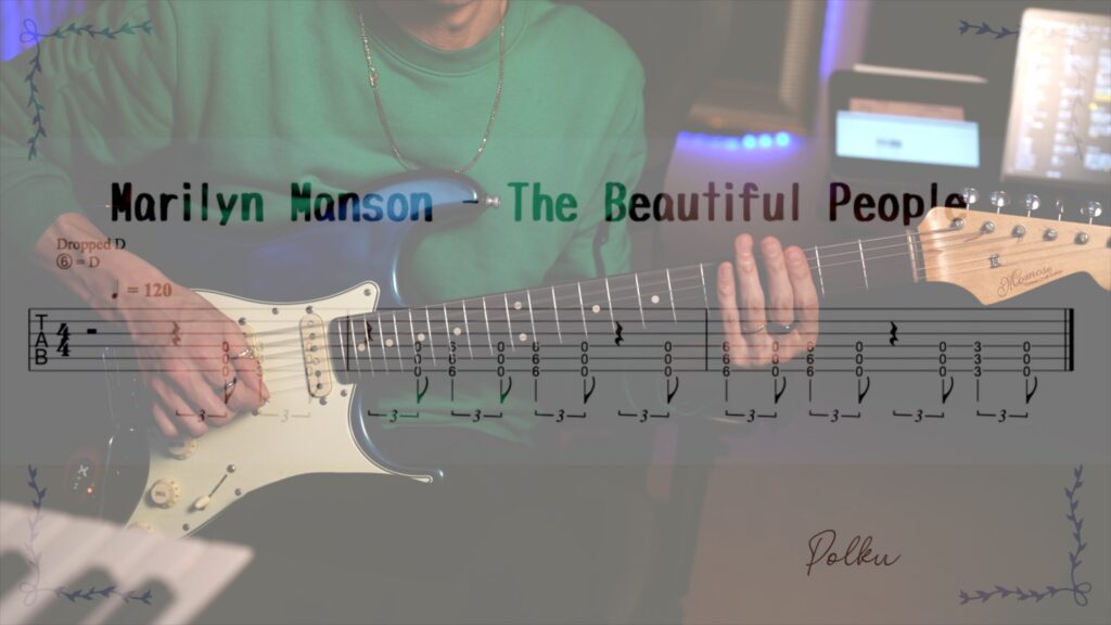 TAB譜と講師が演奏しているかっこいい画像