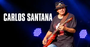 ライブでエレキギターを演奏するカルロス・サンタナ
